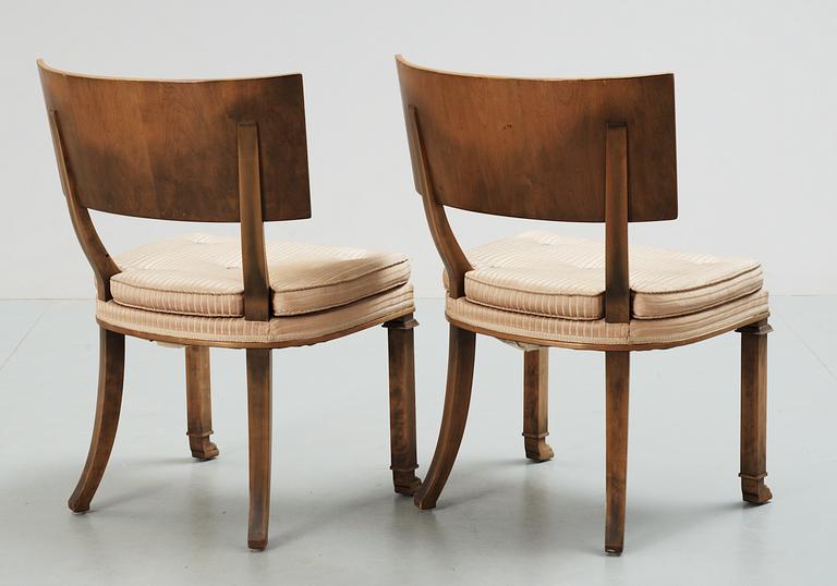 A pair of Axel Einar Hjorth 'Caesar' stained birch chairs by NK 1928.