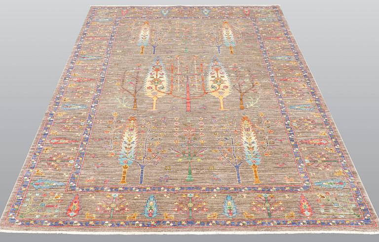 A rug, Ziegler design figural, ca 241 x 169 cm.