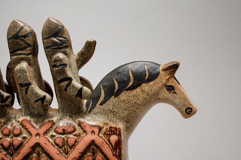 LISA LARSON, a stoneware figurine for K-studion at Gustavsberg, signed, second half of the 20th century.