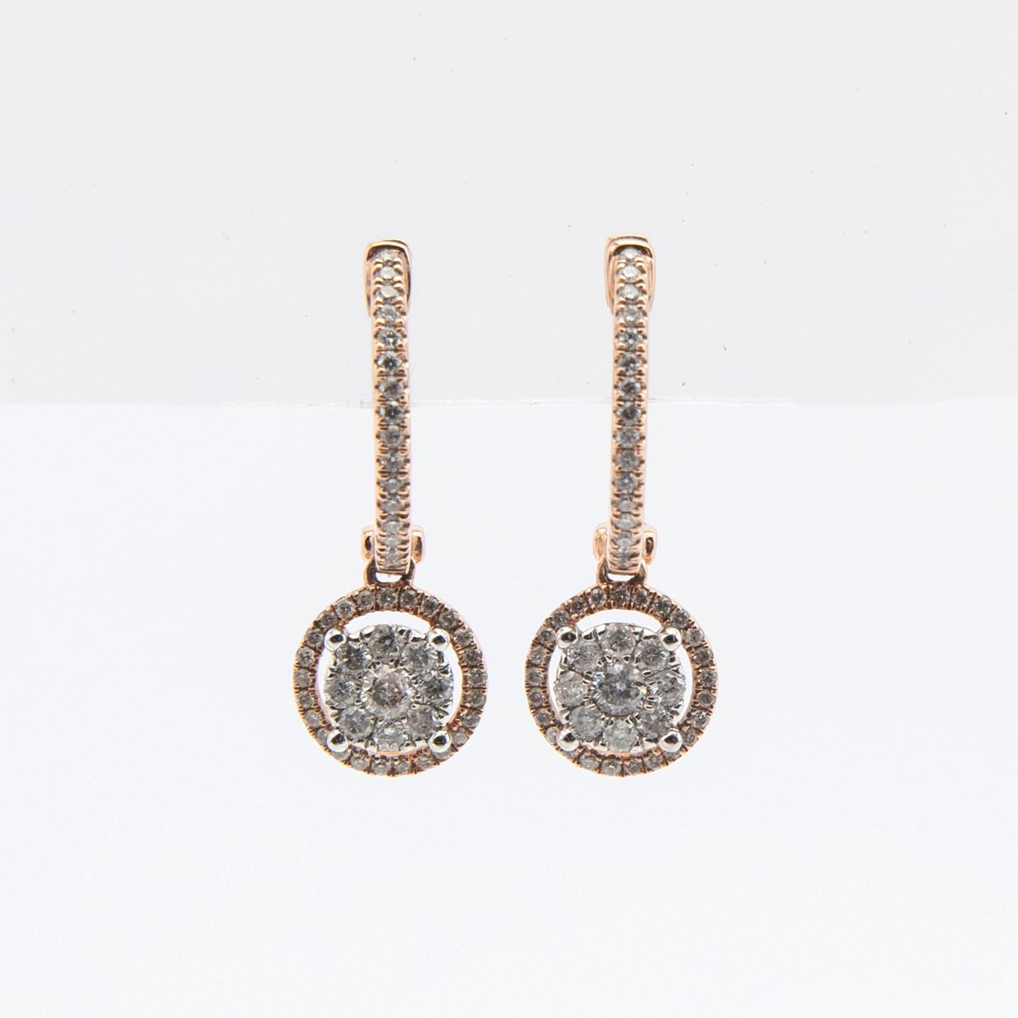 Örhängen, ett par, 14K roseguld med briljantslipade diamanter.