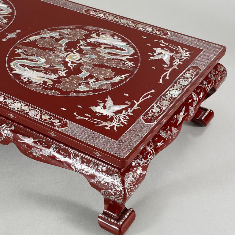 An East Asian table, made in the 1990s.