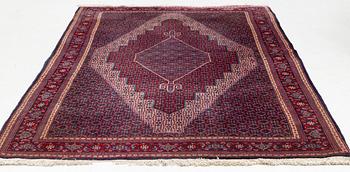 A Moud carpet of Senneh design, approx. 300 x 207 cm.