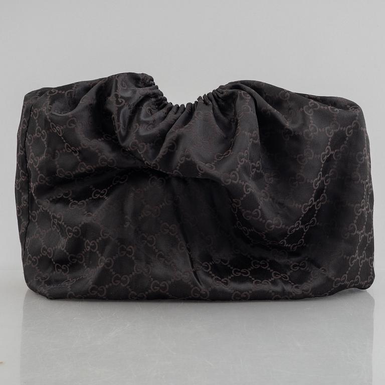 Gucci, A monogram canvas tote bag.