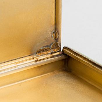 A gilded silver cigarette case with enamel and rose-cut diamonds. Moscow, early 20th century.