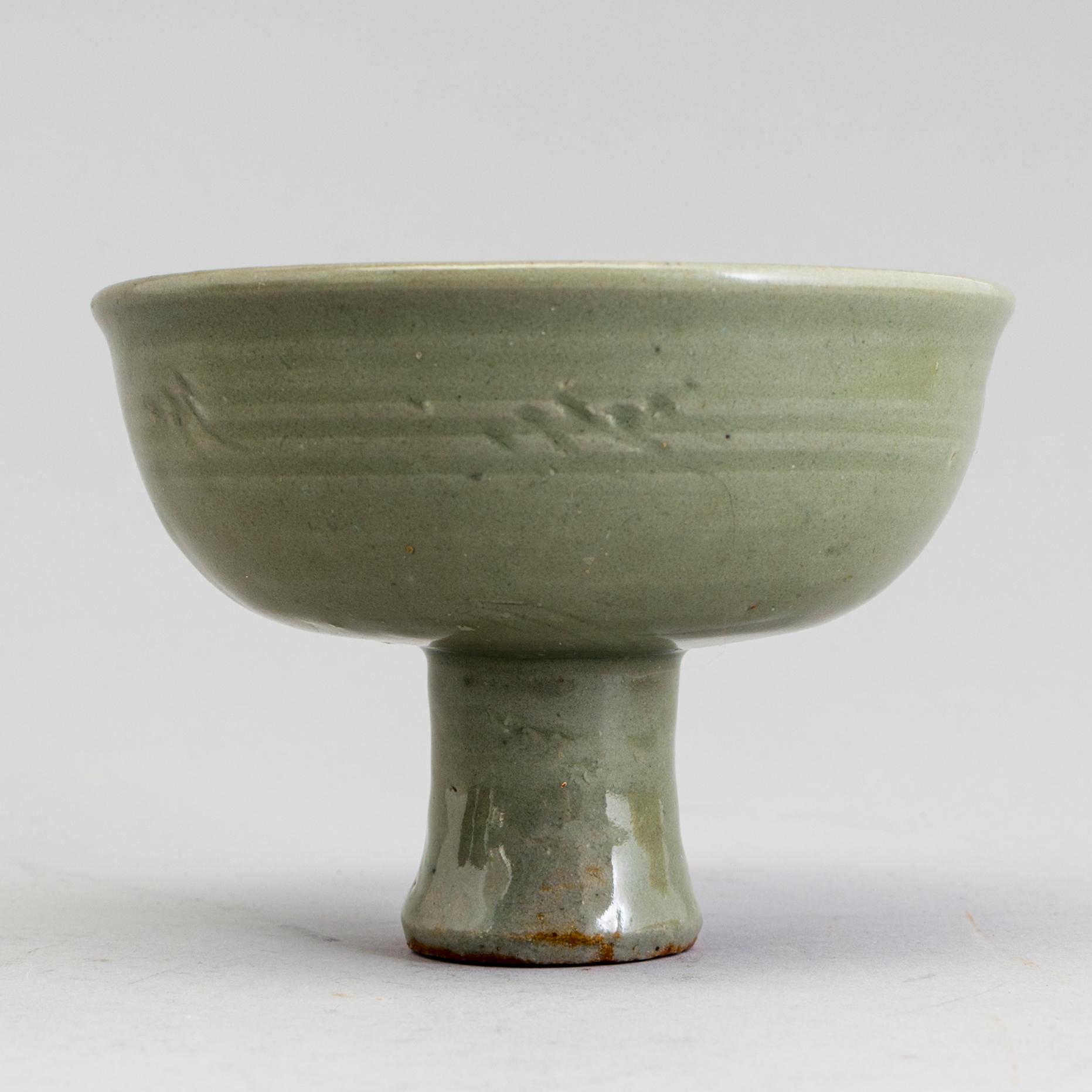 A celadon glazed stem cup, Ming dynasty (1368-1644).