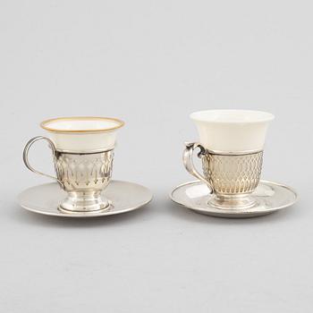 6+6 sterling silver cupholders with saucers and porcelain cups, including John Wanamaker, USA, early 20th century.