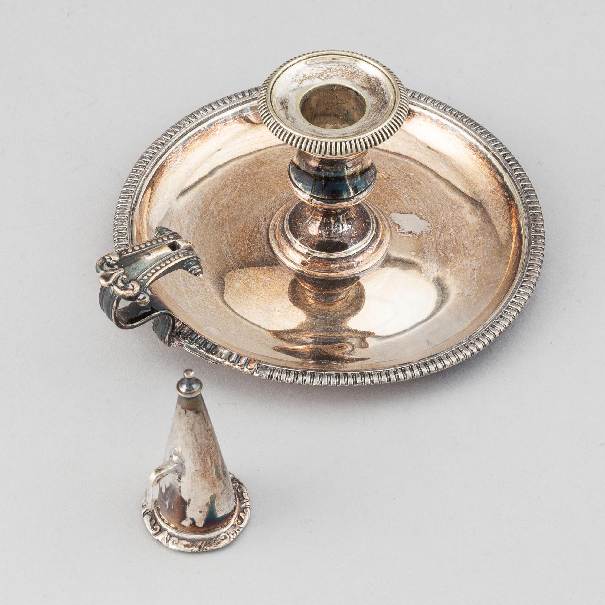 An English 19th century silver-plated chamber-candlestick. Unmarked.