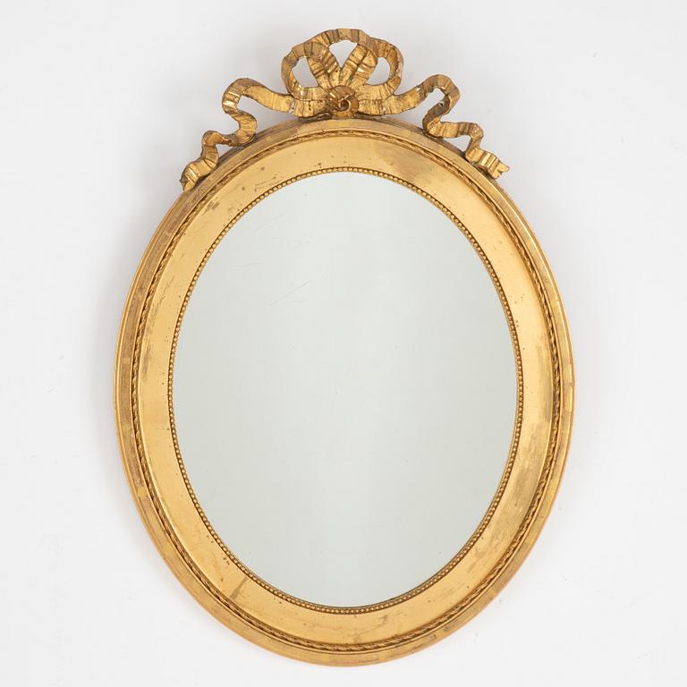 A Gustavian style mirror, first half of the 20th century.