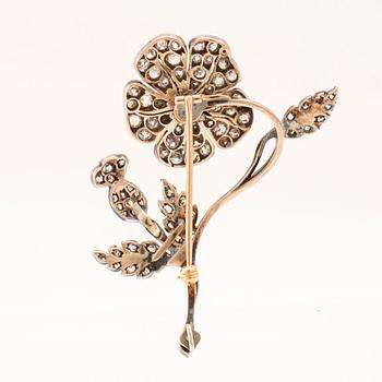 Brooch/pendant in the shape of a flower and thistle with old-cut diamonds.