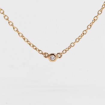 Efva Attling, an 18K gold necklace, with a small diamond, 'My first diamond necklace',