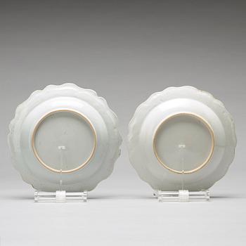 A pair of famille rose armorial soup dishes, Qing dynasty, Qianlong (1736-95).