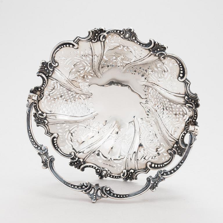 A Victorian sterling silver sweetmeat basket, maker's mark of Henry Wilkinson & Co, Sheffield 1855.