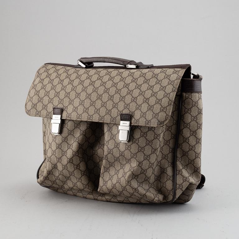 Gucci, a messenger bag.