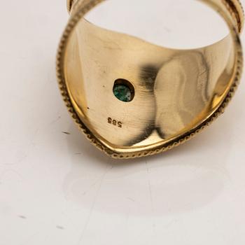 14K gold ring with an emerald.