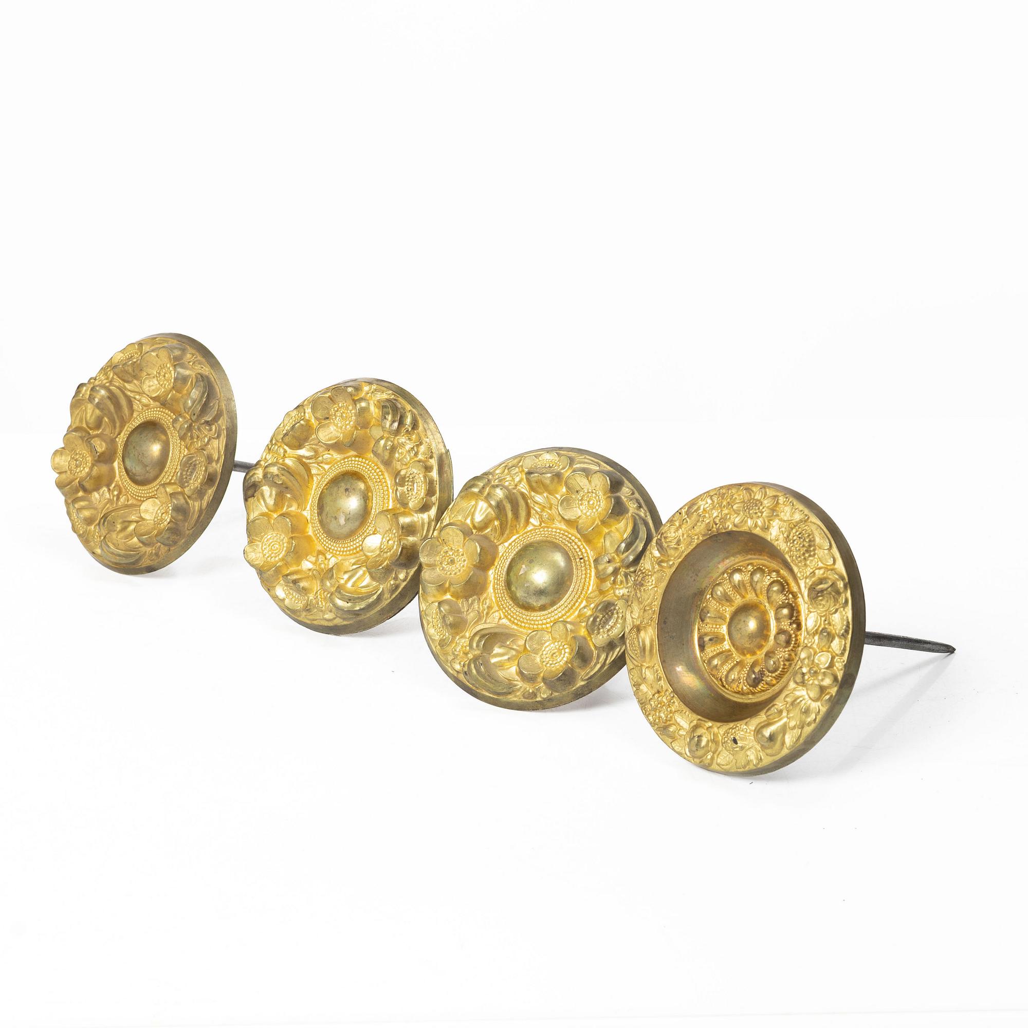 Four Empire curtain tiebacks, early 19th Century.