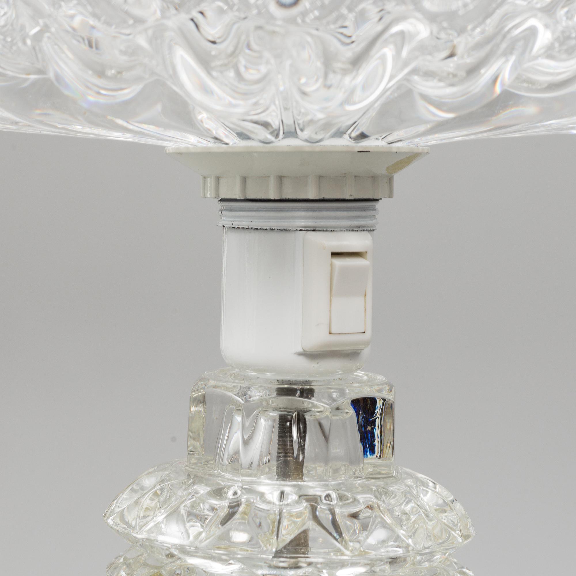 A glass floor lamp.