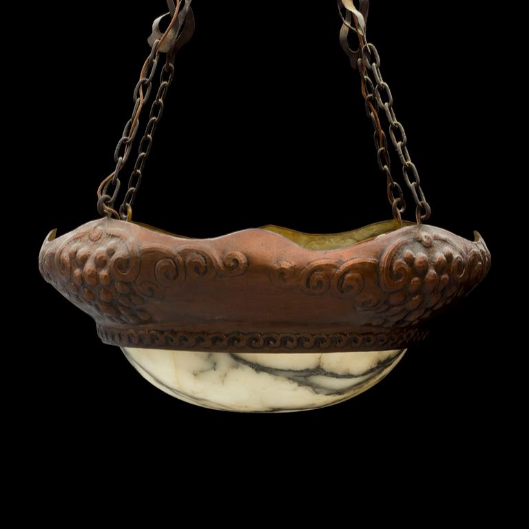 An early 20th century jugend ceiling light.