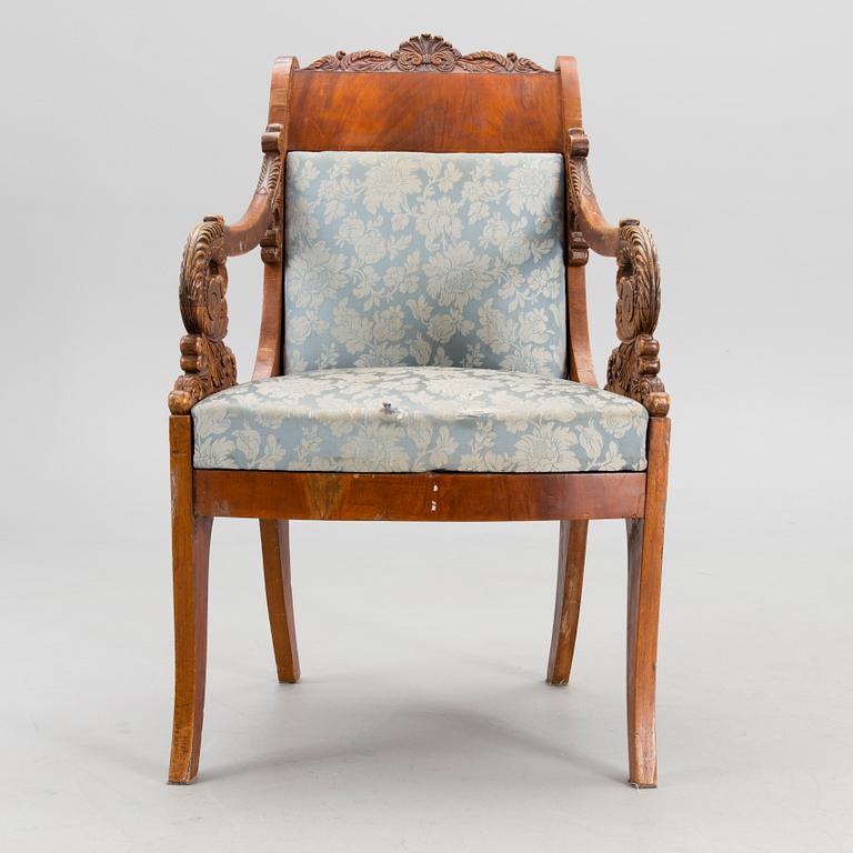 A pair of mid-19th century late Empire Russian open armchair.