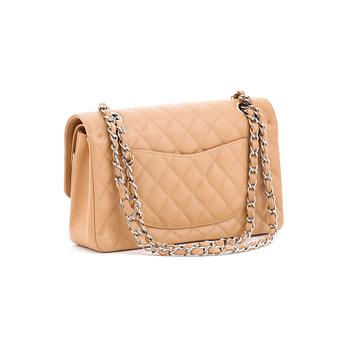 CHANEL, a beige caviar leather "double flap" shoulder bag.