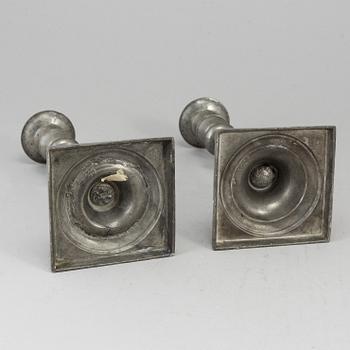 A pair of empire pewter candlesticks, first half of the 19th century.