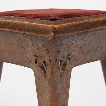 Swedish Art Nouveau, a carved oak stool, early 1900s.
