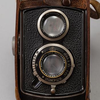 Two Twin Lens Reflex Cameras, a 1950s /60s Yashica 635 and a 1930s Rolleicord.