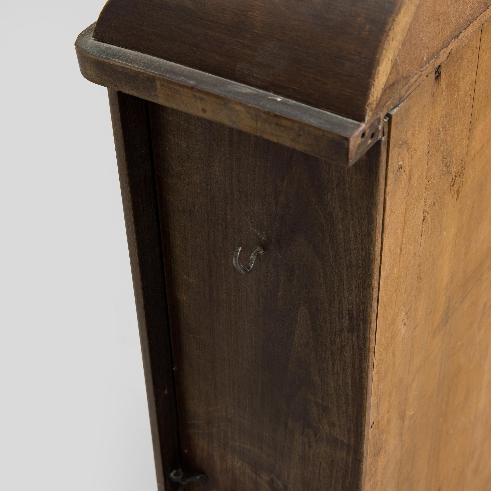 Wall-mounted cabinet / telephone cabinet, early 20th century.