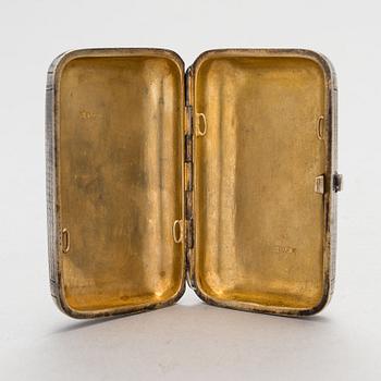 A Russian, parcel-gilt silver cigarette case, maker's mark of Karl Verlin, Saint Petersburg 1871-1878.