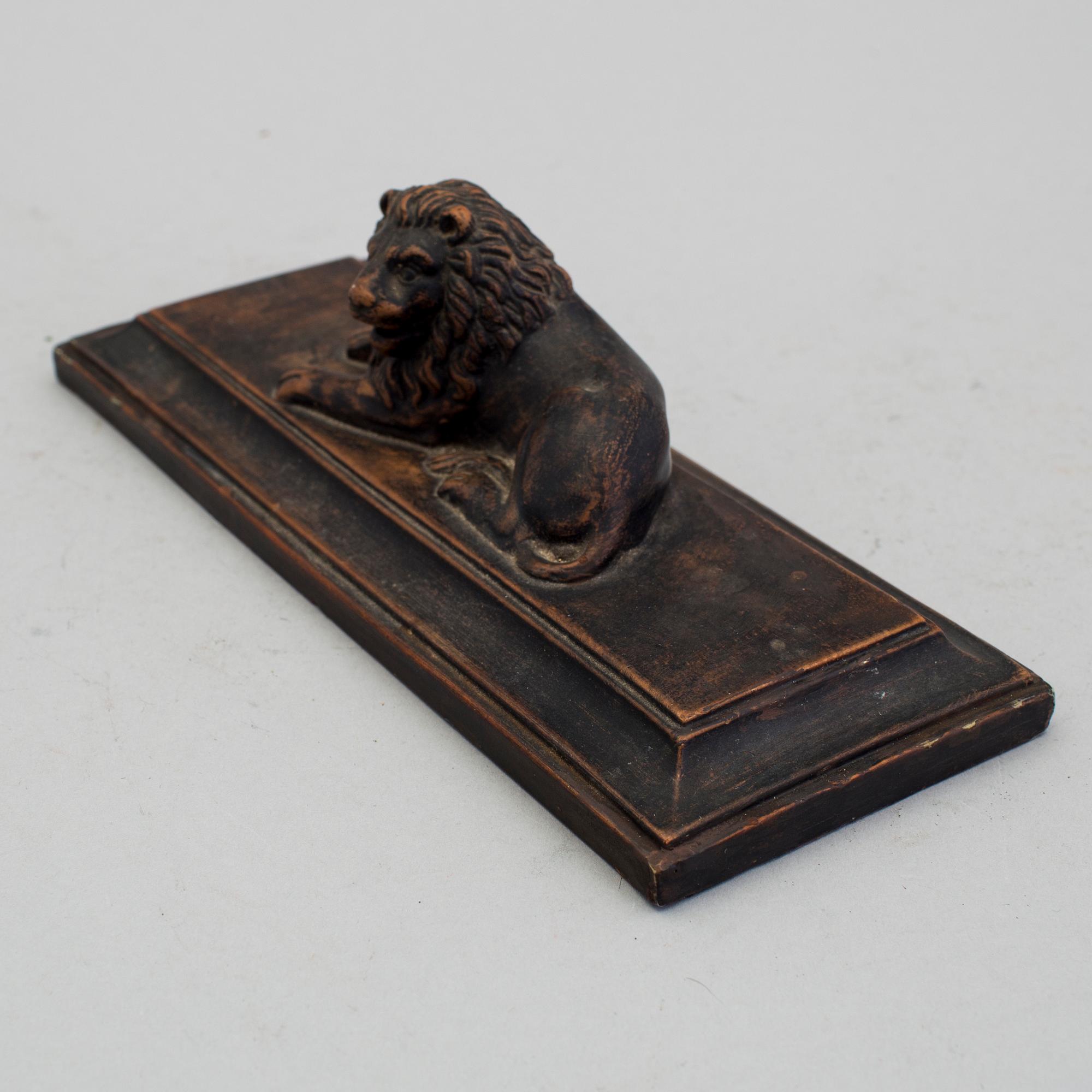 A mid 1800s terracotta paperweight.