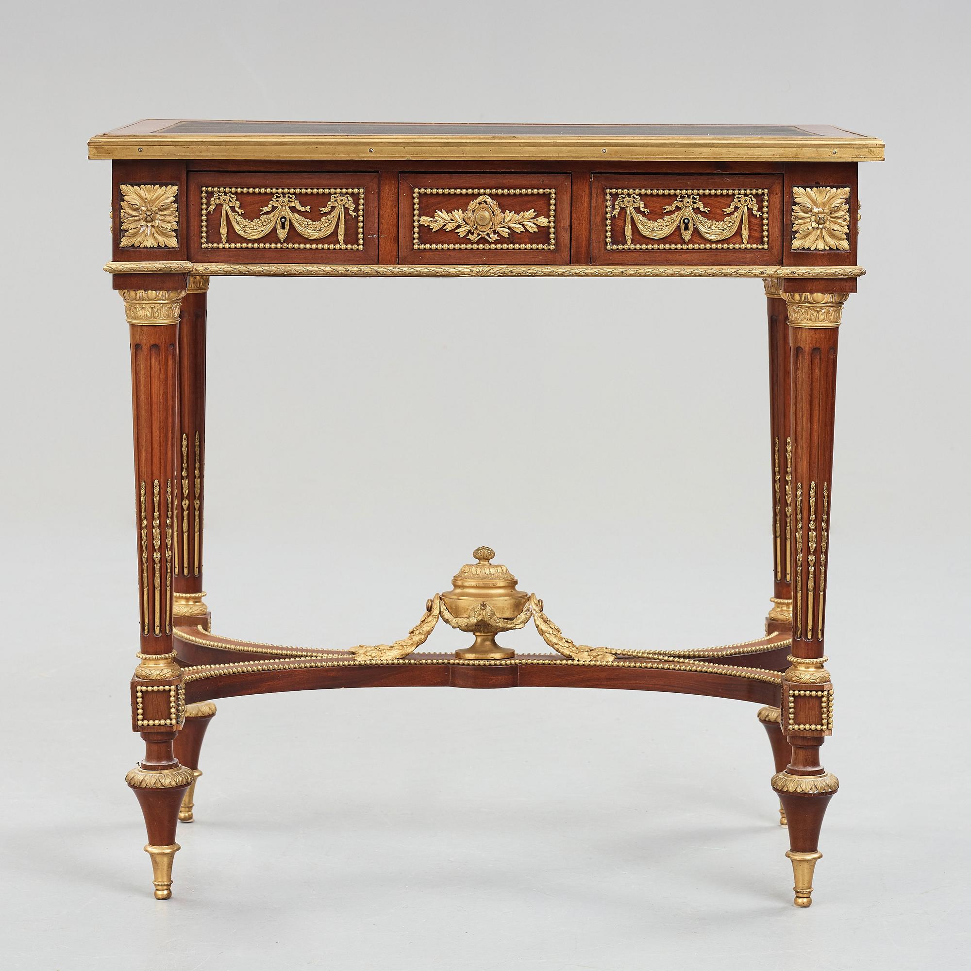 A Louis XVI-style late 19th century table.