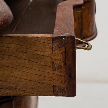 A Dutch 18th century Rococo chest of drawers.