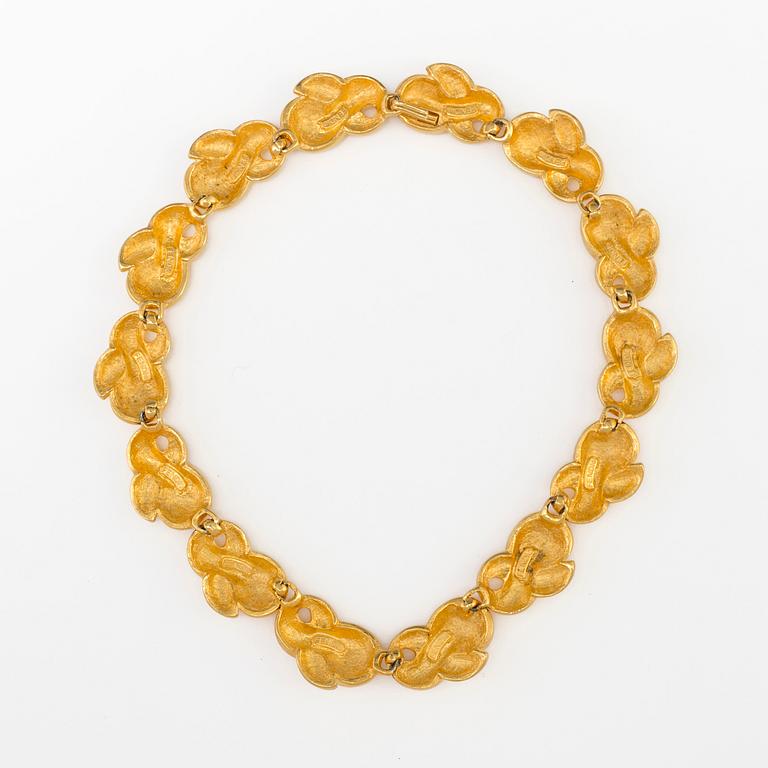 a necklace by Fendi.
