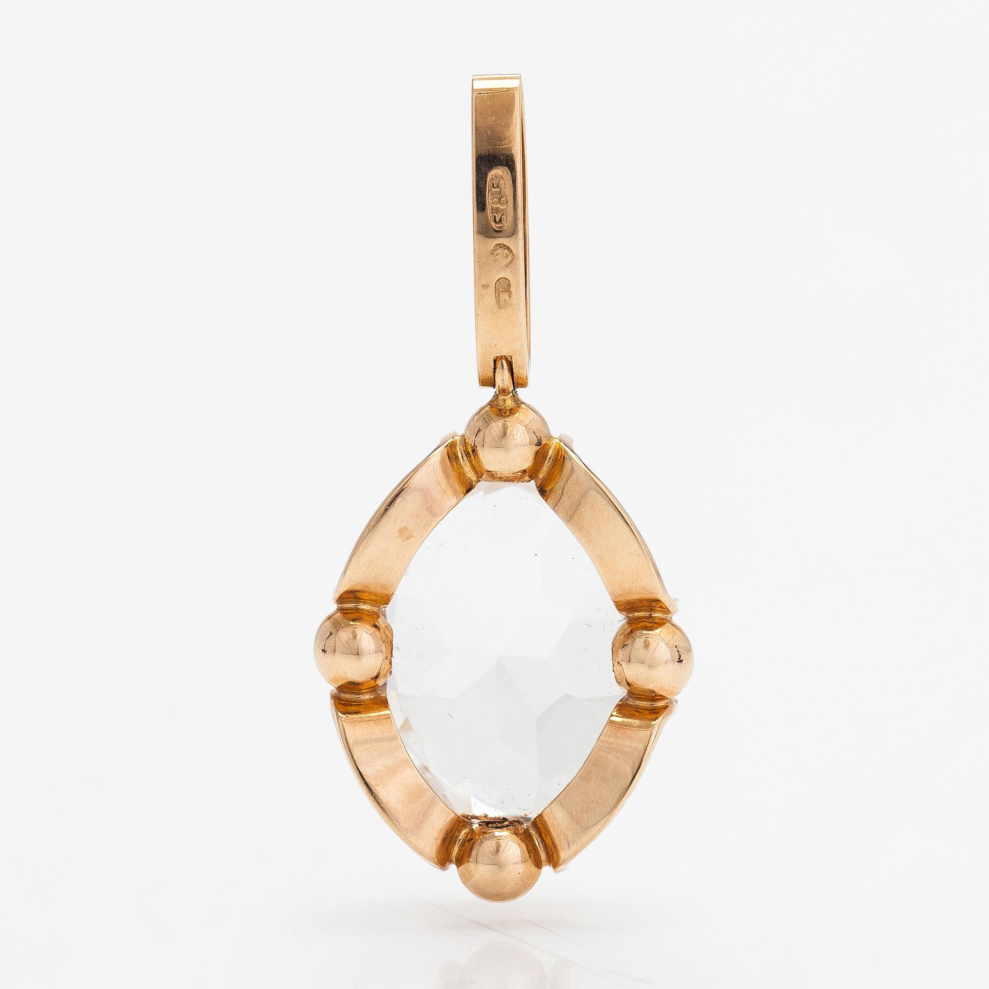 Elis Kauppi, Hänge, 14K guld och bergskristall. Kupittaan kulta, Åbo.