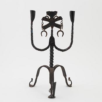 A Seedish wrought-iron three-light candlestick, circa 1900.