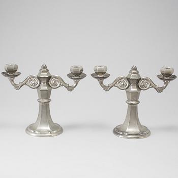 A pair of pewter candelabra by Gerotin, 20th Century.