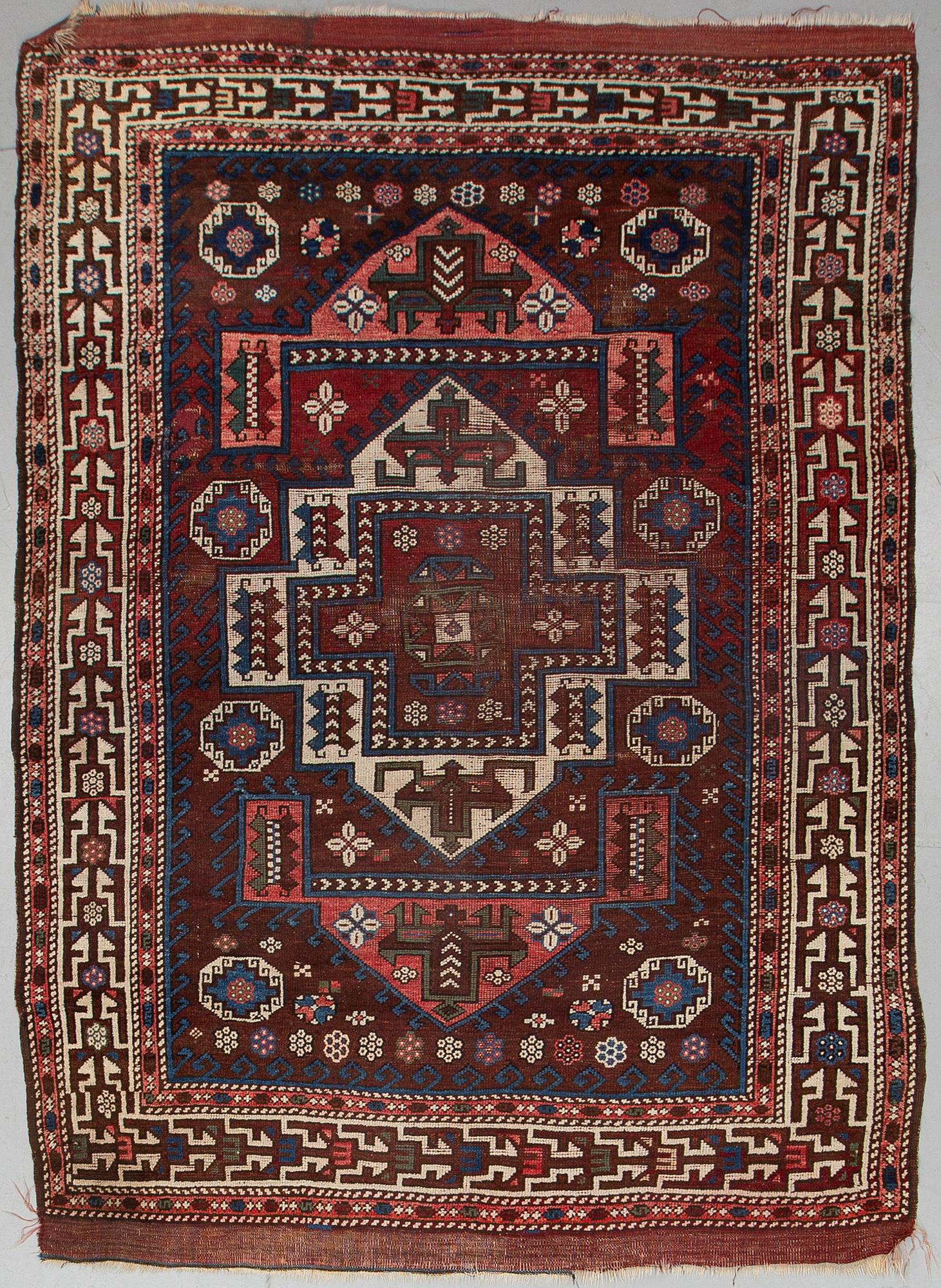 AN ANTIQUE TURKISH RUG, probably Bergama, ca 256 x 183 cm.
