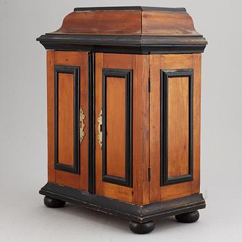 A barocque style spice cabinet, late 19th Century.