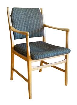 98. AN OAK EASY CHAIR,