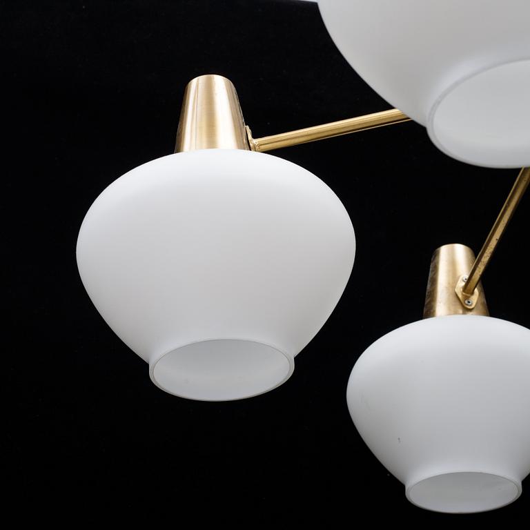A mid 20th Century brass and glass ceiling light from Asea.