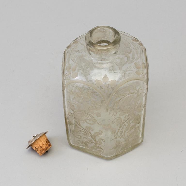 A baroque glass bottle, first half of the 18th century.