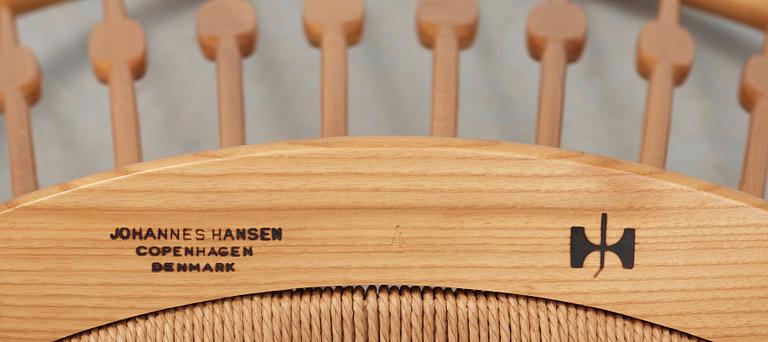 A Hans J Wegner ash and teak 'Peacock chair', Johannes Hansen, Denmark.