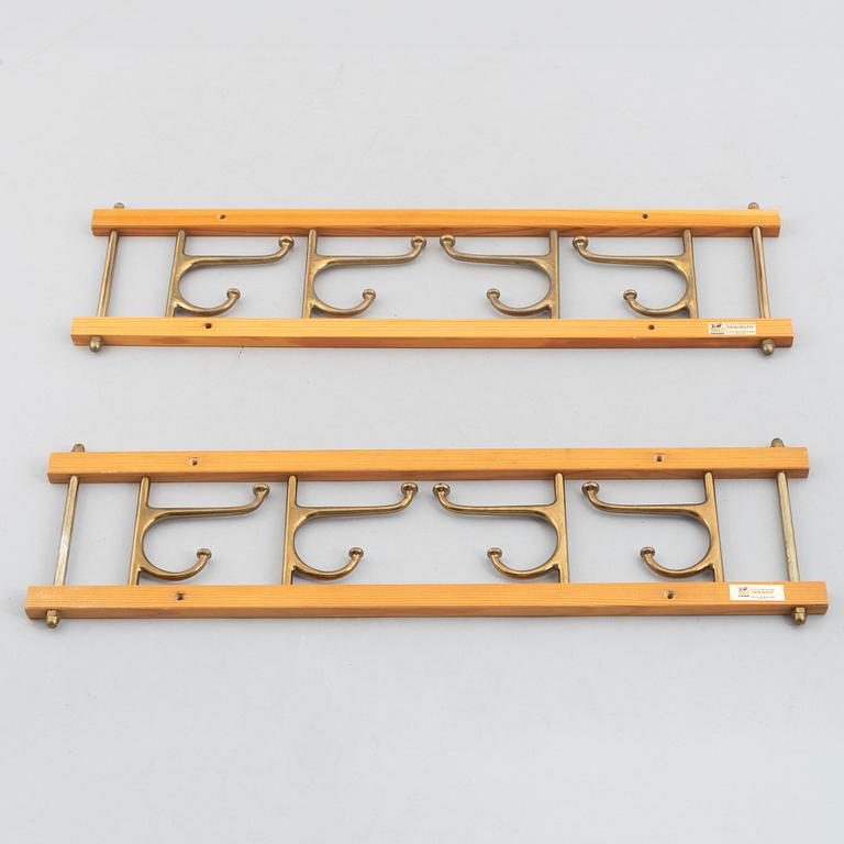 A pair of 'Dekorativ' coat hangers, Skoglunds metallgjuteri, Anderstorp, 1950's/60's.