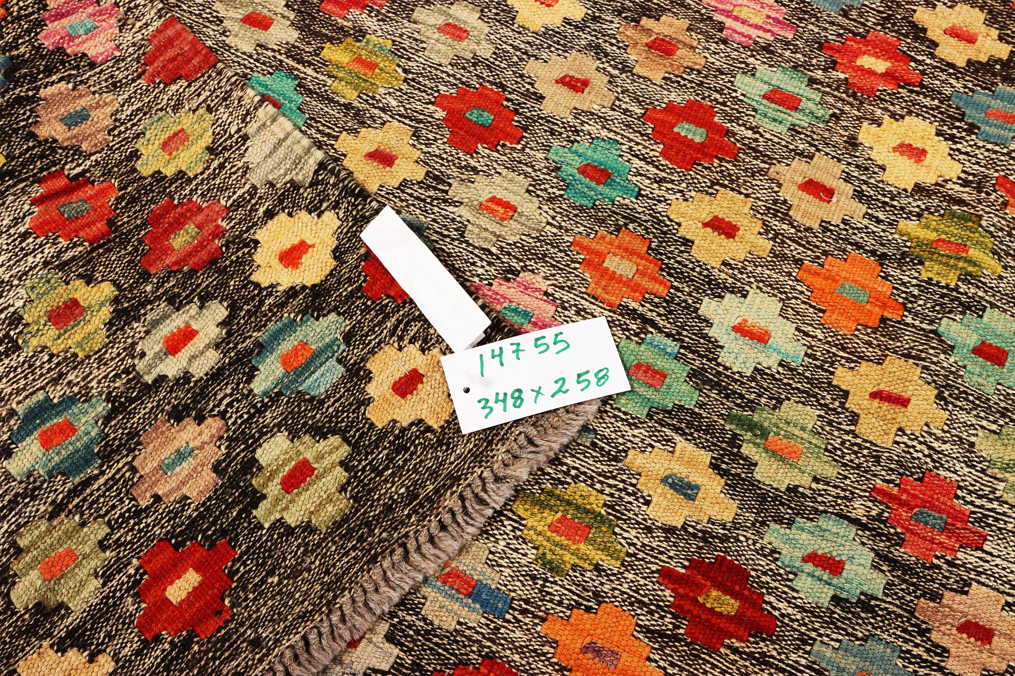 A Kilim carpet, c. 348 x 258 cm.