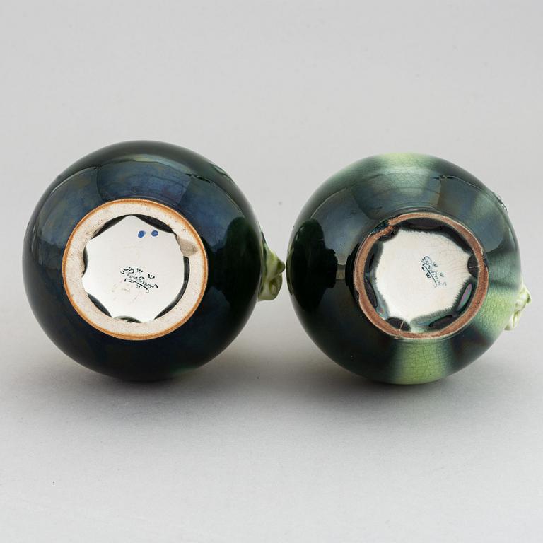 A pair of green glazed ceramic vases decorated with a lizard and an insect, Rörstrand, Sweden. Early 20th century.