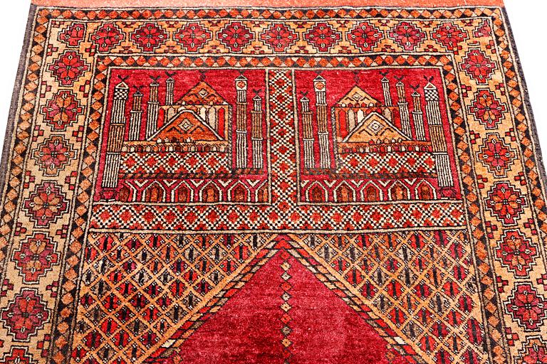 A silk Beluch rug, c. 124 x 81 cm.
