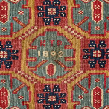 A CUSHION, double-interlocked tapestry, ca 54,5 x 57 cm (with mounting 62 x 64 cm), signed and dated KTD 1802. Scania.