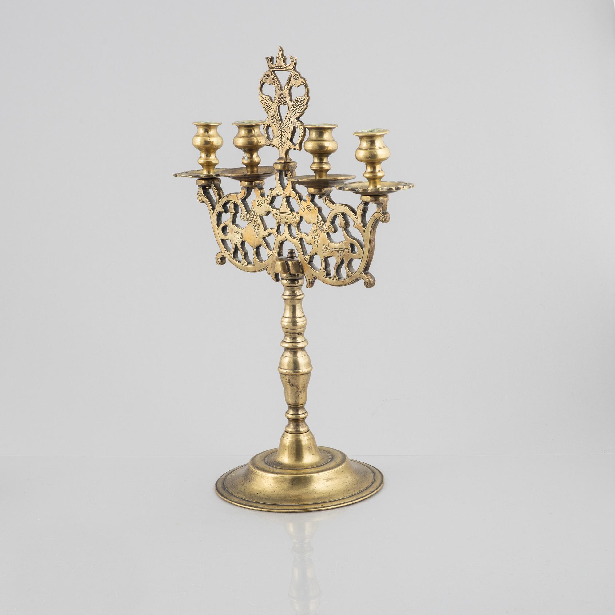 A brass Baroque style candelabra, 18th/19th century.