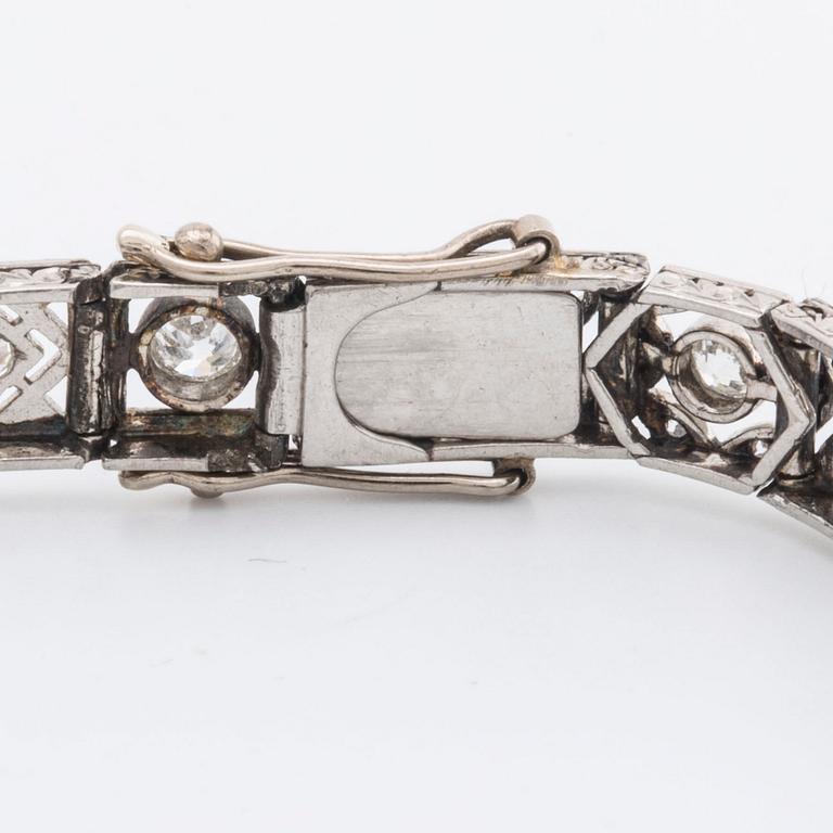 DIAMOND BRACELET, probably platinum, old and rose-cut diamonds approx 2 ct in total, 1 large stone not diamond.