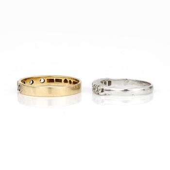 RINGAR, 2 st, med vita stenar, 18K guld.