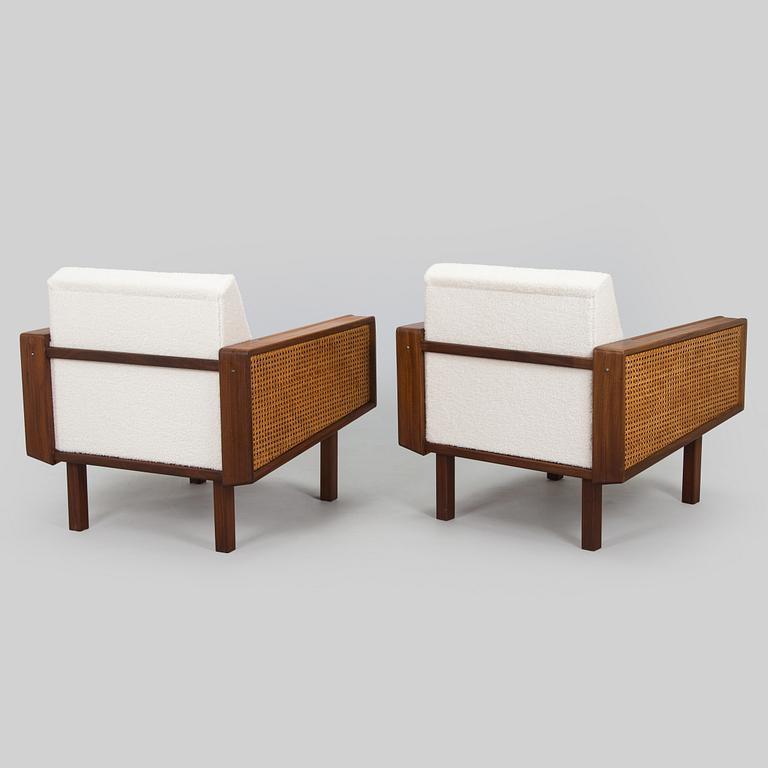 A pair of 1960s armchairs.
